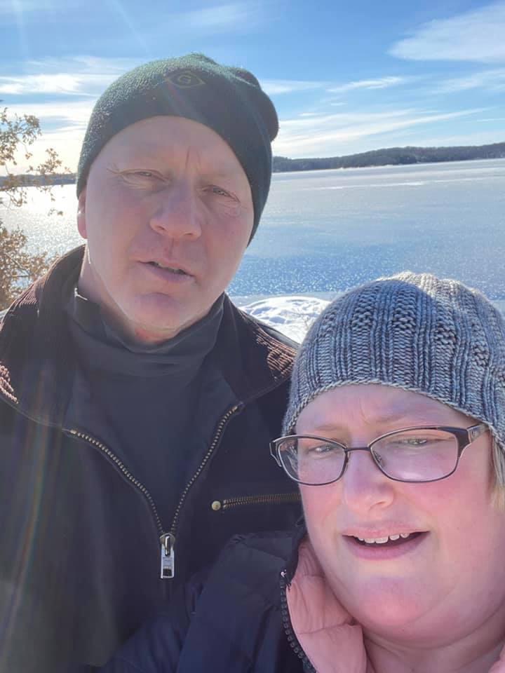 Crystal and Kelly walking together along the Georgian Bay shoreline near Parry Sound, Ontario.